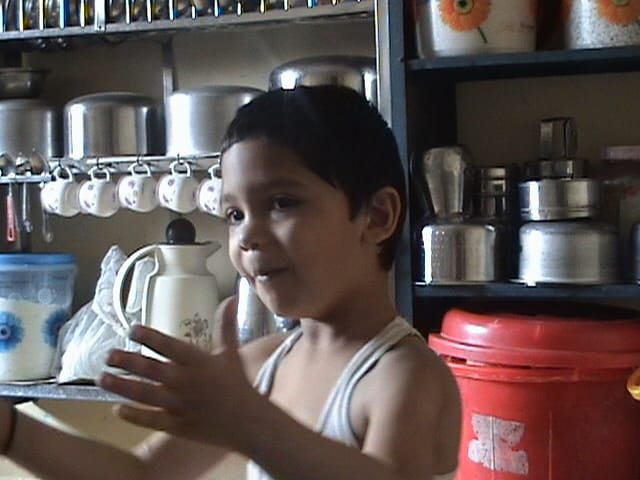 Childhood photo in a kitchen